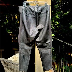 Size 2 xl- Harley Davidson black leather pants with side stretch panels. EUC.